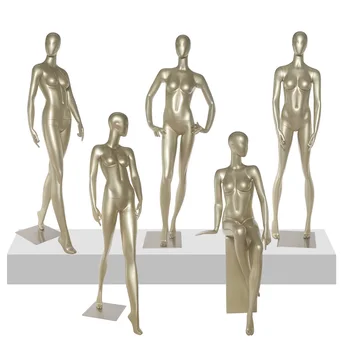 облекло модел женско тяло манекен златен магазин за дрехи прозорец манекен дисплей рафт